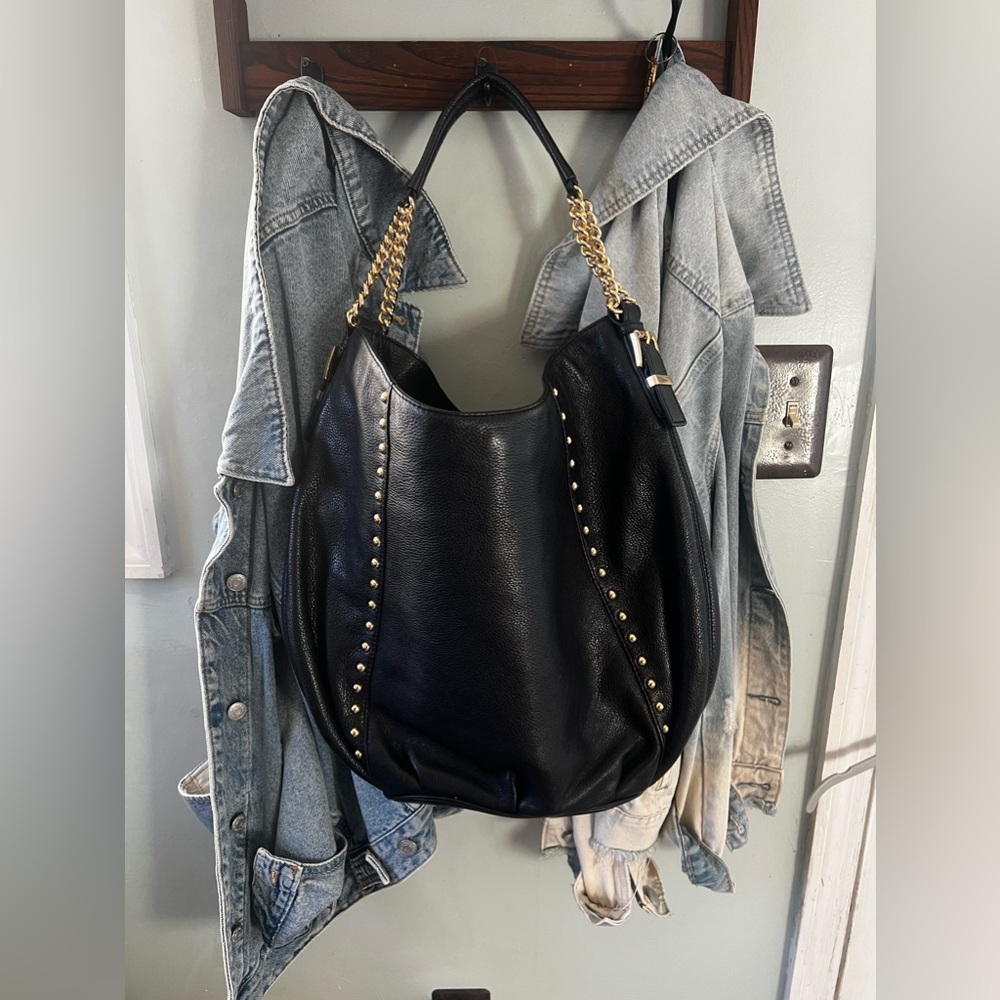 Michael Kors Leather Shoulder Purse with Gold Metal details.